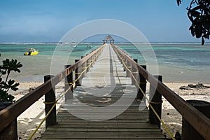 Long wharf over coral bay