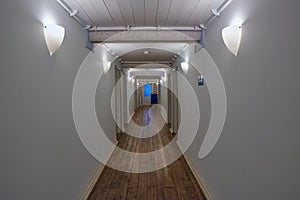 Long white corridor of a wooden house