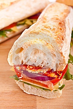 Long white wheat baguette sandwich