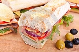 Long white wheat baguette sandwiches