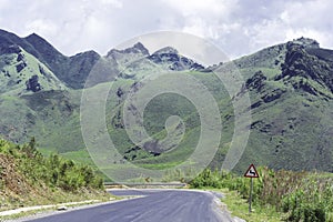 Long And Winding Rural Roads Leading Through Green Hills In Laos, The Route Between Vang Vieng - Luang Prabang