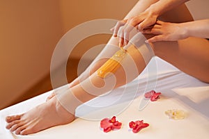 Long Woman Legs. Woman Cares About Her Legs. Sugaring Treatment