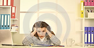 Long working day. tired woman work online on computer. confident office worker. secretary with document folder. formal