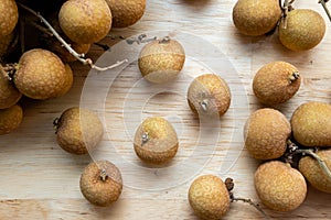 Longan on wooden background