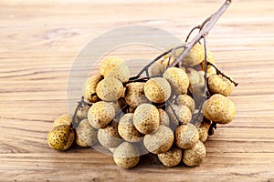 Longan on wooden background. Longan on wooden background.
