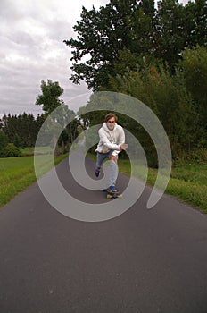 Longboarder going up the hill with speed, vertical