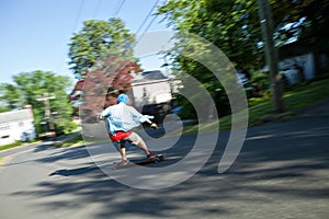 Longboarder Speeding Downhill