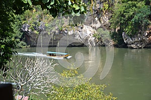 Longboat on the river Kwai