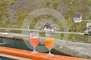 Longdrink on Boat reeling red orange cruseship Norway