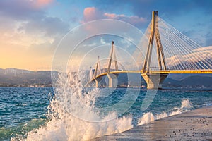 Longest Modern Bridge at the evening sunset time with waves splash