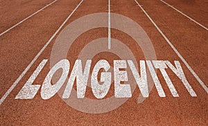 Longevity written on running track, New Concept on running track text in white color