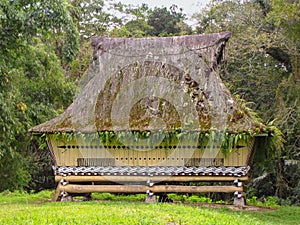 Longhouse that belonged to King Simalungan, outdoor museum in Pematang Purba, Indonesia photo