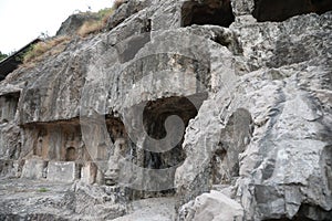 This is the Longmen Grottoes in Luoyang, Henan Province, China, a famous tourist attraction. photo