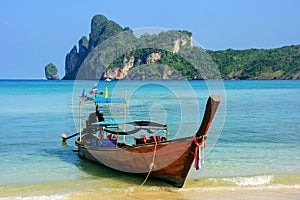 Longtail boat anchored at Ao Loh Dalum beach on Phi Phi Don Island, Krabi Province, Thailand