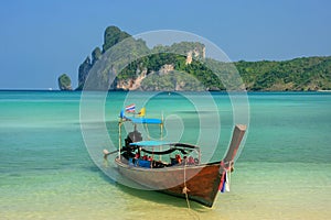 Longtail boat anchored at Ao Loh Dalum beach on Phi Phi Don Island, Krabi Province, Thailand