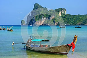 Longtail boat anchored at Ao Loh Dalum beach on Phi Phi Don Island, Krabi Province, Thailand