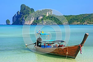 Longtail boat anchored at Ao Loh Dalum beach on Phi Phi Don Island, Krabi Province, Thailand