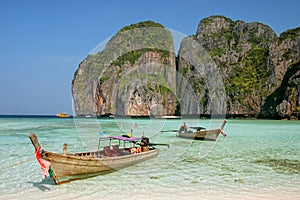 Longtail boat anchored at Maya Bay on Phi Phi Leh Island, Krabi