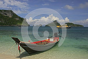 Longtail boat at the beach, Ko Mae Ko island, Ang