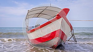 Longtail boat on beach in Malaysia