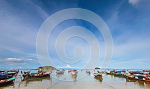 Longtail boat and beautiful ocean with blue sky of Koh Lipe island, Thailand