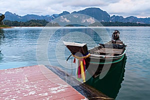 Longtail boat in lake . Ratchaprapha Dam at Khao Sok National Pa