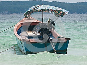 Longtail boat moored at sea in Thailand