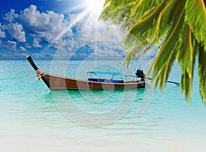 Longtail boat on the sea tropical beach