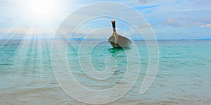 Longtail boat on the sea tropical beach