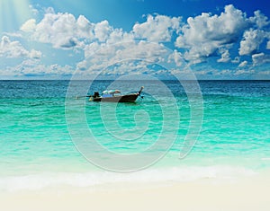 Longtail boat on the sea tropical beach