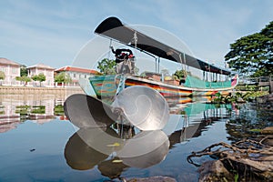 Longtail boat station in canal. Thailand