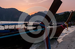 Longtail boat at sunset