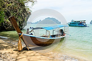 Longtail boat and a tourist cruise boat, Phang Nga Bay, Thailand