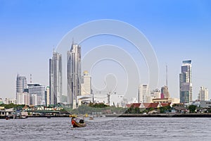Longtail Boat Tours on Chaophraya river and bangkok cityscape ba