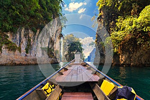 Longtail boat trip in Cheow Lan Lake, Khao Sok National Park, Surat Thani Province, Thailand.