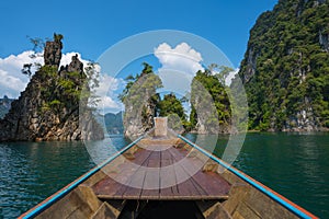 Longtail boat trip in Cheow Lan Lake, Khao Sok National Park, Surat Thani Province, Thailand.