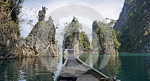 longtail boat trip on chiao lan lake in thailand