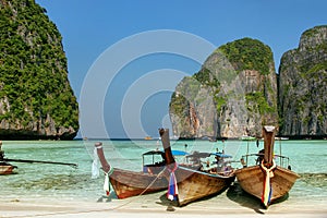 Longtail boats anchored at Maya Bay on Phi Phi Leh Island, Krabi Province, Thailand