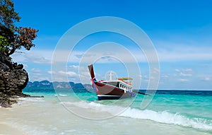 Longtail boats on the beach in thailand