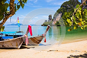Longtail Boats Moored At Aonang Beach in Thailand photo