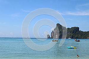 Longtail boats moored at beach of Phi Phi Island, Thailand