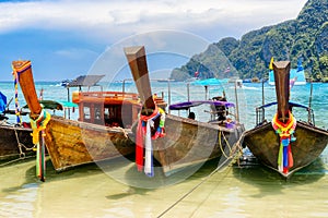 Longtail boats in tropical beach in Phi-Phi island, Thailand