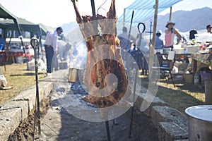 15-02-2019 Lonquimay, Chile. Meat roasted on the stick by a Chilean gaucho in Lonquimay, Chile photo