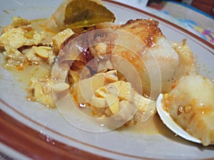 Lontong with opor souce is present on Eid holidays