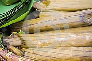 Lontong or rice steam wrapped with banana leaf green natural