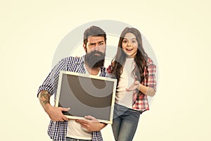 look at that advertisement. childrens day together. small girl and father demonstrate blackboard. education at home