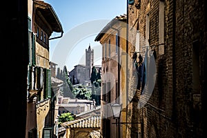 Look through the alleys of Siena in Italy