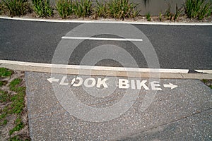 Look Bike raod marking with bike graphic pained on road to alert pedestrians