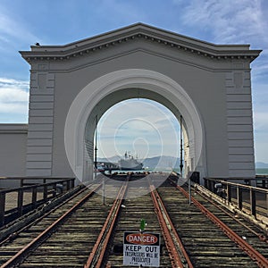 Look through a gate to a ship