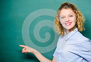 Look here. back to school. woman likes studying. woman teacher at school lesson. happy student at blackboard. knowledge